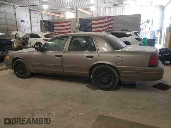 2011 Ford Police Interceptor z VIN 2FABP7BV1BX177043, wystawiony jako Copart lot #56968435 z przebiegiem 151 630 mil mil oraz Szkoda całkowita • Salvage title. Historia ofert i sprzedaży dostępna na DreamBid. Obrazek 2.