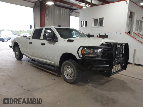 2023 Ram 2500 Tradesman with VIN 3C6UR5HJ1PG606549, listed as a IAAI auction lot 40241030 with 36,958 mi miles. Bid and sale history available at carsss.com. Image 1.