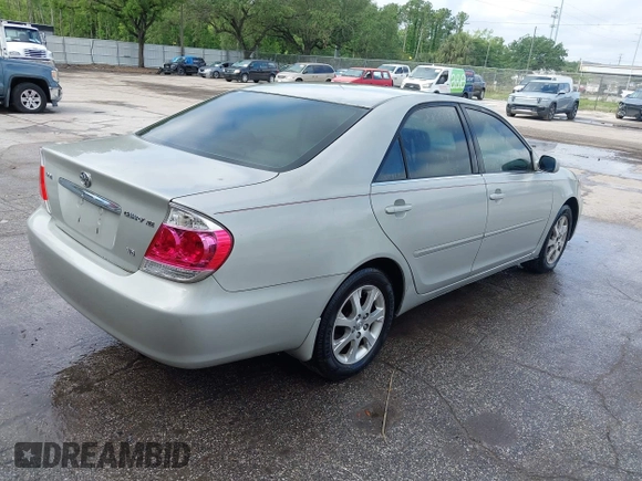 2005 Toyota Camry LE with VIN JTDBF32KX50163799, listed as a IAAI auction lot 41937898 with 140,616 mi miles and . Bid and sale history available at DreamBid. Image 4.