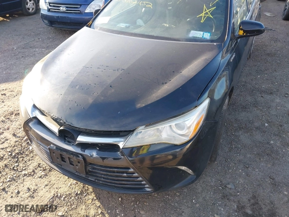2015 Toyota Camry Hybrid LE with VIN 4T1BD1FK0FU163708, listed as a IAAI auction lot 41766167 with 999,999 mi miles. Bid and sale history available at carsss.com. Image 6.