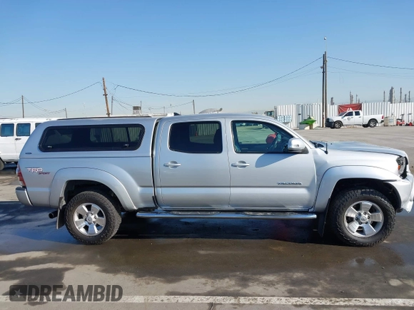 2013 Toyota Tacoma PreRunner with VIN 3TMKU4HN8DM034338, listed as a IAAI auction lot 41808842 with 142,012 mi miles and . Bid and sale history available at DreamBid. Image 13.