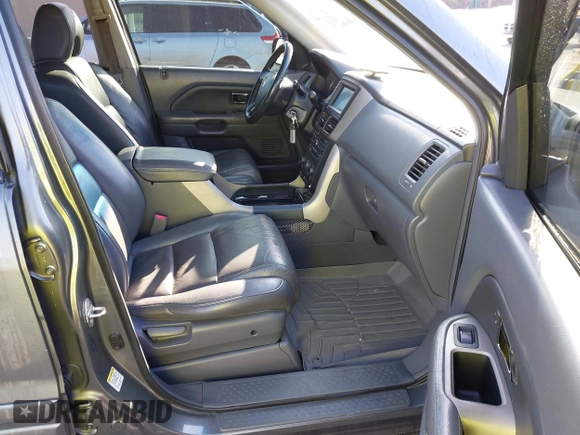 2007 Honda Pilot EX-L with VIN 2HKYF18727H528564, listed as a IAAI auction lot 42010708 with 260,364 mi miles and . Bid and sale history available at DreamBid. Image 5.