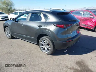 2022 Mazda CX-30 S Select z VIN 3MVDMBBL0NM415511, wystawiony jako IAAI lot #41513247 z przebiegiem Nie podano mil oraz . Historia ofert i sprzedaży dostępna na DreamBid. Obrazek 3.
