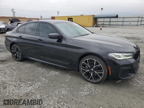 2021 BMW 5 Series 530e with VIN WBA13AG00MCF09677, listed as a Copart auction lot 54907205 with 50,033 mi miles and Salvage title. Bid and sale history available at DreamBid. Image 4.