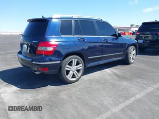 2012 Mercedes-Benz GLK 350 with VIN WDCGG8HB2CF805749, listed as a IAAI auction lot 42031442 with 152,313 mi miles and . Bid and sale history available at carsss.com. Image 4.