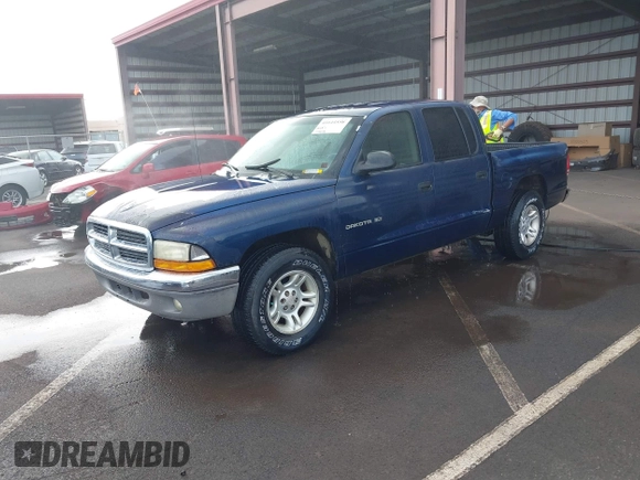 2001 Dodge Dakota Sport with VIN 1B7GL2AX01S133957, listed as a IAAI auction lot 41644558 with 156,008 mi miles. Bid and sale history available at carsss.com. Image 2.