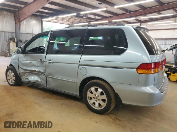 2004 Honda Odyssey EX-L z VIN 5FNRL18044B020316, wystawiony jako Copart lot #56027435 z przebiegiem 192 429 mil mil oraz Szkoda całkowita • Salvage title. Historia ofert i sprzedaży dostępna na DreamBid. Obrazek 2.