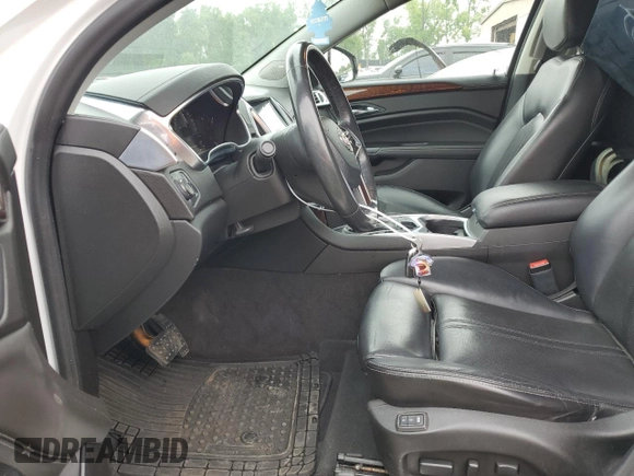 2015 Cadillac SRX Premium Collection with VIN 3GYFNGE32FS528514, listed as a Copart auction lot 61222534 with 104,433 mi miles and Salvage Title. Bid and sale history available at carsss.com. Image 7.