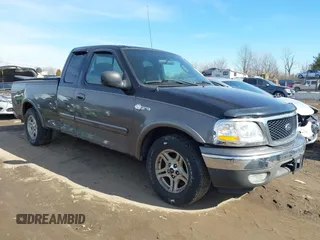 2003 Ford F-150 XL with VIN 1FTRX17W53NB00671, listed as a IAAI auction lot 41576739 with 194,066 mi miles. Bid and sale history available at carsss.com. Image 1.