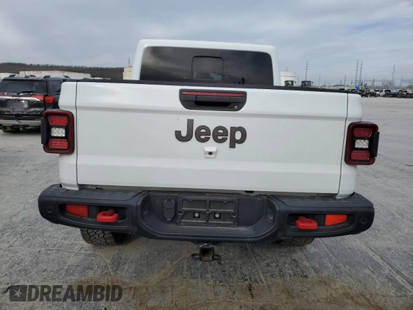 2020 Jeep Gladiator Rubicon z VIN 1C6JJTBG3LL156802, wystawiony jako Copart lot #48904865 z przebiegiem 30 704 mil mil oraz Szkoda całkowita • Salvage title. Historia ofert i sprzedaży dostępna na DreamBid. Obrazek 6.