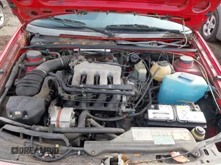 1991 Volkswagen Passat z VIN WVWFB4315ME035691, wystawiony jako IAAI lot #41627396 z przebiegiem 168 795 mil mil oraz . Historia ofert i sprzedaży dostępna na DreamBid. Obrazek 10.