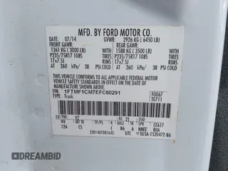 2014 Ford F-150 XL with VIN 1FTMF1CM7EFC60291, listed as a IAAI auction lot 42503556 with 215,474 mi miles and . Bid and sale history available at DreamBid. Image 9.