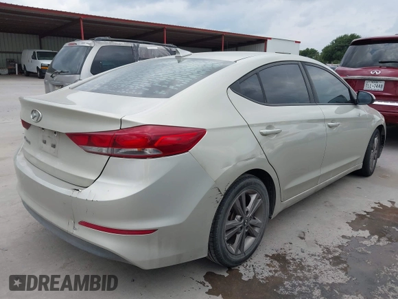 2018 Hyundai Elantra SEL z VIN 5NPD84LF4JH358837, wystawiony jako IAAI lot #42158320 z przebiegiem 111 682 mil mil oraz . Historia ofert i sprzedaży dostępna na DreamBid. Obrazek 4.