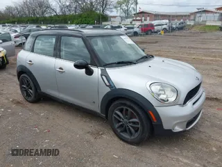 2011 MINI Countryman S with VIN WMWZC5C51BWM10385, listed as a IAAI auction lot 41952679 with 112,008 mi miles and . Bid and sale history available at DreamBid. Image 1.