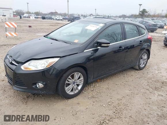 2012 Ford Focus SEL with VIN 1FAHP3M28CL336001, listed as a IAAI auction lot 40876771 with 147,017 mi miles. Bid and sale history available at carsss.com. Image 2.