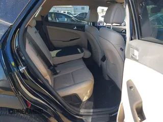 2017 Hyundai Tucson SE Plus with VIN KM8J33A49HU381233, listed as a IAAI auction lot 41393645 with 83,708 mi miles. Bid and sale history available at carsss.com. Image 8.