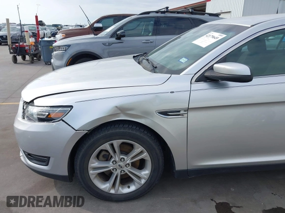 2015 Ford Taurus SEL z VIN 1FAHP2E88FG133328, wystawiony jako IAAI lot #42179649 z przebiegiem 127 171 mil mil oraz . Historia ofert i sprzedaży dostępna na DreamBid. Obrazek 6.