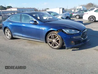 2015 Tesla Model S 85D with VIN 5YJSA1S28FF085223, listed as a IAAI auction lot 41642710 with 94,291 mi miles. Bid and sale history available at carsss.com. Image 1.