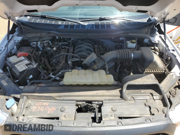 2021 Ford F-150 XL with VIN 1FTFW1E59MFD09567, listed as a Copart auction lot 52706195 with 104,716 mi miles and Salvage Title. Bid and sale history available at carsss.com. Image 11.
