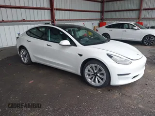 2023 Tesla Model 3 z VIN 5YJ3E1EA9PF451171, wystawiony jako IAAI lot #42270708 z przebiegiem 54 379 mil mil oraz . Historia ofert i sprzedaży dostępna na DreamBid. Obrazek 1.