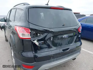 2016 Ford Escape SE with VIN 1FMCU9GX9GUA62830, listed as a IAAI auction lot 42014409 with 1 mi miles. Bid and sale history available at carsss.com. Image 19.