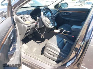2020 Honda CR-V Hybrid Touring with VIN 7FART6H9XLE006371, listed as a IAAI auction lot 41978709 with 74,695 mi miles. Bid and sale history available at carsss.com. Image 5.