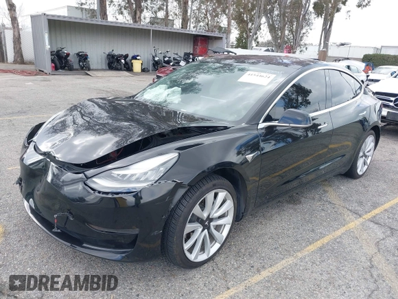 2018 Tesla Model 3 Long Range Battery with VIN 5YJ3E1EA9JF009384, listed as a IAAI auction lot 41544624 with 66,896 mi miles and . Bid and sale history available at DreamBid. Image 19.