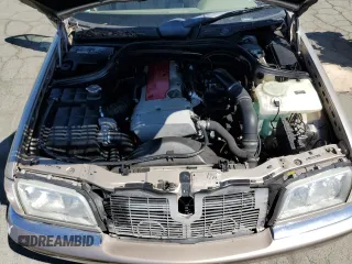 2000 Mercedes-Benz C 230 Kompressor with VIN WDBHA24G5YA826317, listed as a Copart auction lot 69146854 with 103,928 mi miles and Salvage Title. Bid and sale history available at carsss.com. Image 12.