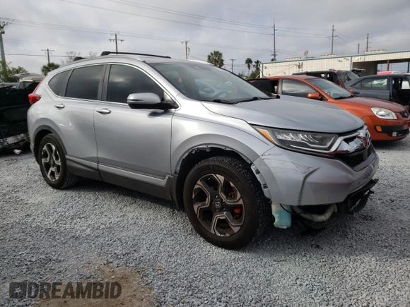2018 Honda CR-V Touring with VIN 7FARW1H93JE055337, listed as a Copart auction lot 45045305 with 74,776 mi miles and Salvage Title. Bid and sale history available at DreamBid. Image 4.