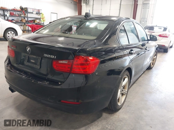 2013 BMW 3 Series 328i xDrive with VIN WBA3B3C53DF542421, listed as a IAAI auction lot 42228850 with 96,660 mi miles and . Bid and sale history available at DreamBid. Image 4.