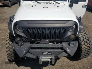 2013 Jeep Wrangler Unlimited Rubicon with VIN 1C4HJWFG2DL549064, listed as a Copart auction lot 56474055 with 148,217 mi miles and Salvage title. Bid and sale history available at DreamBid. Image 11.