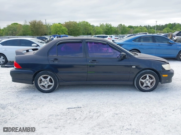 2002 Mitsubishi Lancer OZ-Rally with VIN JA3AJ86E22U074890, listed as a IAAI auction lot 42029591 with 235,818 mi miles. Bid and sale history available at carsss.com. Image 13.
