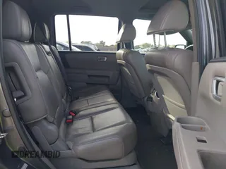 2012 Honda Pilot EX-L with VIN 5FNYF3H51CB036501, listed as a IAAI auction lot 41703208 with 223,984 mi miles. Bid and sale history available at carsss.com. Image 8.