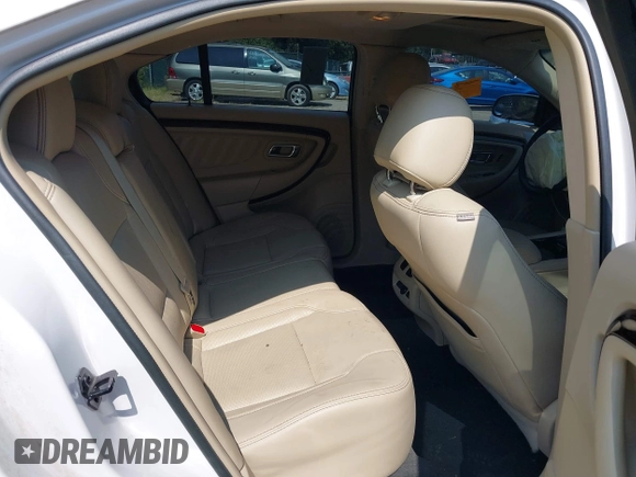 2014 Ford Taurus Limited with VIN 1FAHP2F8XEG181491, listed as a IAAI auction lot 40277144 with 107,374 mi miles. Bid and sale history available at carsss.com. Image 8.