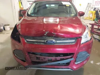 2015 Ford Escape SE with VIN 1FMCU0GXXFUC86876, listed as a IAAI auction lot 41727877 with 114,387 mi miles. Bid and sale history available at carsss.com. Image 6.
