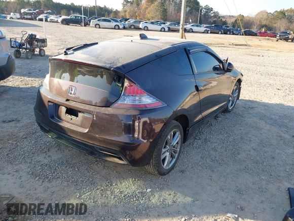 2013 Honda CR-Z with VIN JHMZF1D43DS002794, listed as a IAAI auction lot 41015432 with 133,343 mi miles. Bid and sale history available at carsss.com. Image 4.