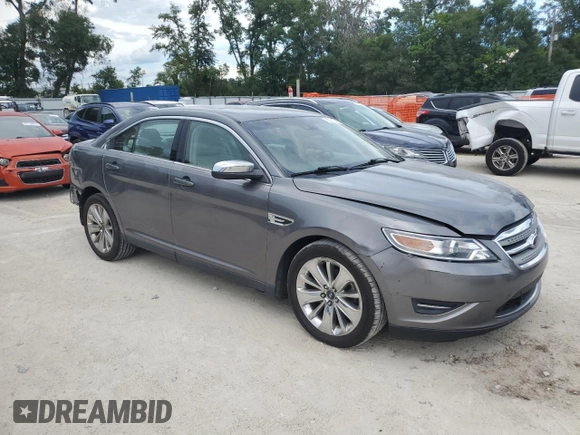 2011 Ford Taurus Limited with VIN 1FAHP2FW3BG184887, listed as a Copart auction lot 60717875 with 196,102 mi miles and Salvage title. Bid and sale history available at DreamBid. Image 4.