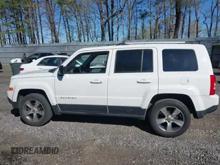 2016 Jeep Patriot High Altitude with VIN 1C4NJRFB6GD696544, listed as a IAAI auction lot 42134516 with 160,328 mi miles and . Bid and sale history available at DreamBid. Image 14.