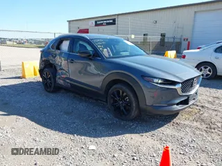 2023 Mazda CX-30 2.5 S Carbon Edition with VIN 3MVDMBCM5PM528946, listed as a IAAI auction lot 41882936 with 62,815 mi miles. Bid and sale history available at carsss.com. Image 1.
