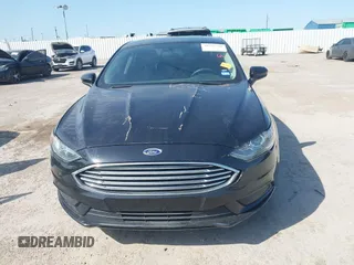 2018 Ford Fusion SE z VIN 3FA6P0H74JR125761, wystawiony jako IAAI lot #41992708 z przebiegiem 102 242 mil mil oraz . Historia ofert i sprzedaży dostępna na DreamBid. Obrazek 12.