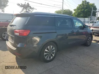 2015 Kia Sedona SX with VIN KNDMC5C10F6047335, listed as a Copart auction lot 66235414 with 154,460 mi miles and Salvage Title. Bid and sale history available at carsss.com. Image 3.