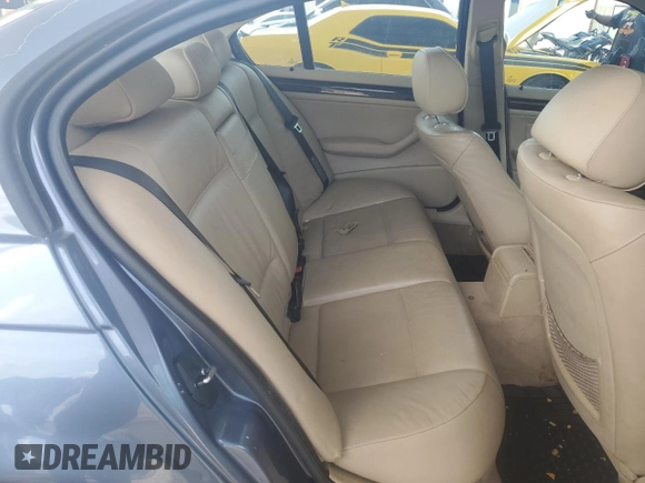 2005 BMW 3 Series 325i with VIN WBAEV33415KX10041, listed as a Copart auction lot 61673545 with 117,294 mi miles and Salvage title. Bid and sale history available at DreamBid. Image 10.