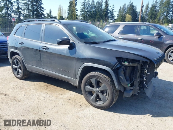 2015 Jeep Cherokee North with VIN 1C4PJMCS3FW777973, listed as a IAAI auction lot 42043203 with 158,536 mi miles. Bid and sale history available at carsss.com. Image 1.