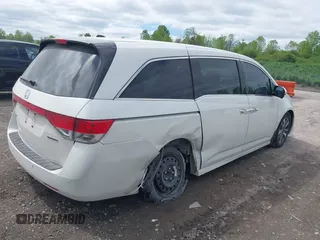 2015 Honda Odyssey Touring Elite с VIN 5FNRL5H91FB012330, выставлен на аукционе IAAI как лот 42307107 с пробегом 152 087 миль миль и . История ставок и продаж доступна на DreamBid. Изображение 4.