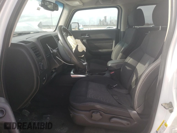 2007 Hummer H3 SUV with VIN 5GTDN13E278167626, listed as a Copart auction lot 86366074 with 128,668 mi miles and Salvage Title. Bid and sale history available at DreamBid. Image 7.