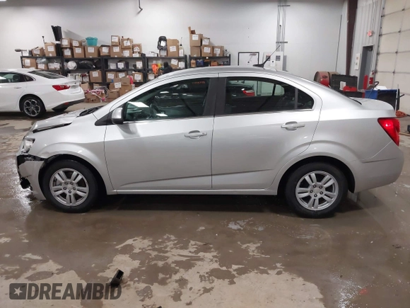 2014 Chevrolet Sonic LT with VIN 1G1JC5SG8E4107664, listed as a IAAI auction lot 41614306 with 128,946 mi miles and . Bid and sale history available at DreamBid. Image 14.