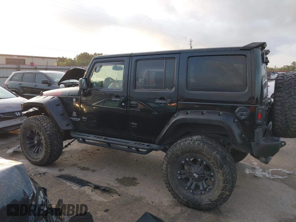 2013 Jeep Wrangler Unlimited Rubicon with VIN 1C4BJWFG2DL531203, listed as a IAAI auction lot 40729064 with 84,296 mi miles. Bid and sale history available at carsss.com. Image 14.
