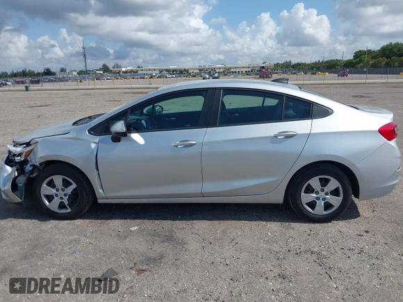 2017 Chevrolet Cruze LS z VIN 1G1BC5SM5H7233199, wystawiony jako IAAI lot #42168232 z przebiegiem 48 052 mil mil oraz . Historia ofert i sprzedaży dostępna na DreamBid. Obrazek 14.