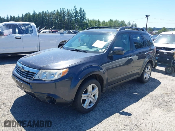 2009 Subaru Forester X with VIN JF2SH636X9G793415, listed as a IAAI auction lot 42614382 with 116,965 mi miles and . Bid and sale history available at DreamBid. Image 2.