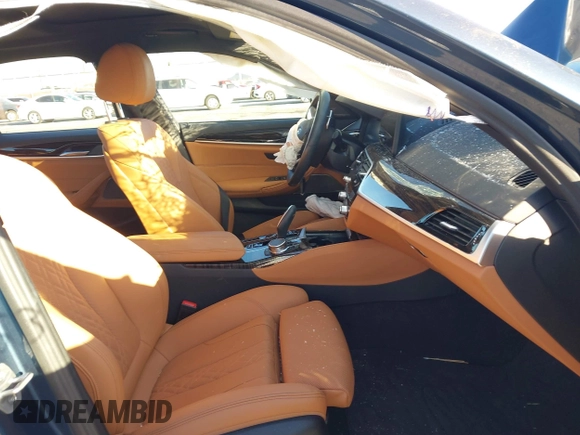2023 BMW 5 Series 530e z VIN WBA13AG02PCM95685, wystawiony jako IAAI lot #41403195 z przebiegiem Nie podano mil oraz . Historia ofert i sprzedaży dostępna na DreamBid. Obrazek 5.